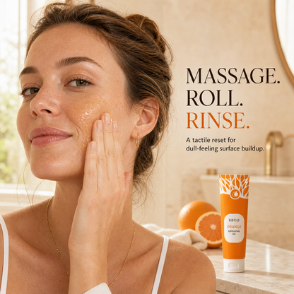 Woman gently massaging BBOJI Orange Exfoliating Gel onto her cheek