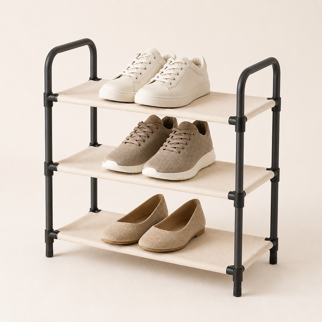 Three-tier ivory fabric shoe rack with neutral shoes
